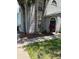 Charming two-story condo with a landscaped front yard and well-maintained exterior at 1608 Columbia Arms Cir # 126, Kissimmee, FL 34741