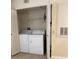 Laundry closet with a washer and dryer at 1608 Columbia Arms Cir # 126, Kissimmee, FL 34741