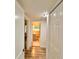 Hallway view leading to a bathroom with a sink and toilet at 1615 Ne 9Th St, Ocala, FL 34470
