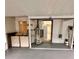Laundry area with washer, dryer, water heater, and utility sink at 1615 Ne 9Th St, Ocala, FL 34470
