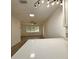 Bright living room with quartz countertops, and an adjacent kitchen at 1615 Ne 9Th St, Ocala, FL 34470