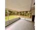 Enclosed porch with lots of natural light and views to the backyard at 1615 Ne 9Th St, Ocala, FL 34470