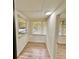 Bright room with laminate flooring and a large window with blinds at 1615 Ne 9Th St, Ocala, FL 34470