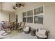 Covered patio with an outdoor dining and seating area, ideal for entertaining at 1704 Pine Ridge Dr, Davenport, FL 33896