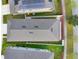 Aerial view showcases the roof and backyard of the property with manicured lawn at 178 Aberdeen St, Davenport, FL 33896