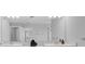 Bathroom featuring dual sinks, a walk-in shower, and ample counter space at 178 Aberdeen St, Davenport, FL 33896