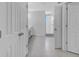 Bright bathroom features a walk-in shower, a vanity, and neutral tile flooring at 178 Aberdeen St, Davenport, FL 33896