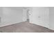 Neutral bedroom with large closet and grey carpet at 178 Aberdeen St, Davenport, FL 33896