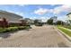 Paved entry to the Chelsea Park neighborhood, featuring lush landscaping at 178 Aberdeen St, Davenport, FL 33896