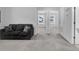 Comfortable living room featuring neutral tones and plush seating, creating a perfect spot for relaxation and entertainment at 178 Aberdeen St, Davenport, FL 33896
