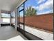 Relaxing screened-in patio with brick wall and outdoor sitting space at 178 Aberdeen St, Davenport, FL 33896