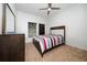 Comfortable bedroom with a ceiling fan and neutral walls at 205 Lakeshore Dr, Davenport, FL 33837