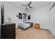 Relaxing bedroom with ceiling fan and neutral color scheme at 205 Lakeshore Dr, Davenport, FL 33837