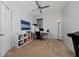 Well-lit bedroom with modern desk and shelving at 205 Lakeshore Dr, Davenport, FL 33837