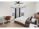 Cozy bedroom with a desk, chair and a lot of natural light at 2108 Celebration Blvd, Celebration, FL 34747