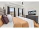 Comfortable main bedroom with large windows and neutral tones at 2108 Celebration Blvd, Celebration, FL 34747