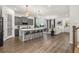 Modern open concept kitchen features a large island and seamless flow into the living area at 2108 Celebration Blvd, Celebration, FL 34747