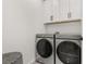 Convenient laundry room with modern washer and dryer at 2108 Celebration Blvd, Celebration, FL 34747