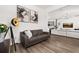 Cozy living room featuring modern decor, stylish lighting, and an open layout at 2108 Celebration Blvd, Celebration, FL 34747