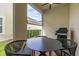 Enclosed patio with outdoor seating and view of landscaped backyard at 2108 Celebration Blvd, Celebration, FL 34747
