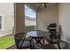 Screened patio with outdoor seating and a view of the backyard at 2108 Celebration Blvd, Celebration, FL 34747