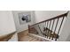 View of the staircase leading down to the dining room showcasing the railing at 2108 Celebration Blvd, Celebration, FL 34747