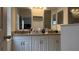 Bathroom featuring a long dual-sink vanity with great storage space at 2646 Quarterdeck Ct, Kissimmee, FL 34743
