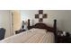 Comfortable bedroom with queen-sized bed, side tables, and decorative wall art at 2646 Quarterdeck Ct, Kissimmee, FL 34743