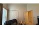 Bright living room featuring a closet and windows with curtains at 2646 Quarterdeck Ct, Kissimmee, FL 34743