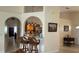 Open-concept living room with bar seating overlooking a well-equipped kitchen at 2646 Quarterdeck Ct, Kissimmee, FL 34743