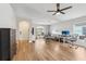 Spacious living room with wood floors and a large window, providing ample natural light at 2700 Palm Isle Way, Orlando, FL 32829