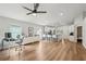 Open-concept space with a living area, kitchen, and dining area with recessed lighting and fan at 2700 Palm Isle Way, Orlando, FL 32829
