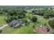Vast aerial shot showcasing the property with sprawling land, animal enclosures, and serene surroundings at 2851 Granada Blvd, Kissimmee, FL 34746