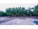 Large fenced animal enclosure with covered shelters, offering a safe and spacious environment for various animals at 2851 Granada Blvd, Kissimmee, FL 34746
