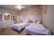 bedroom featuring two twin beds with unicorn decor, creating a whimsical and playful space at 2851 Granada Blvd, Kissimmee, FL 34746