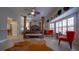 Spacious bedroom with four poster bed, and many hats for decor at 2851 Granada Blvd, Kissimmee, FL 34746
