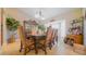 The dining room has a large bay window and a china cabinet for storing dishes and glassware at 2851 Granada Blvd, Kissimmee, FL 34746