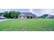 Beautiful home with mature trees and lush greenery on a spacious lot at 2851 Granada Blvd, Kissimmee, FL 34746