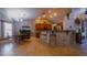 Open concept kitchen with granite countertops, stainless appliances, and bar seating at 2851 Granada Blvd, Kissimmee, FL 34746