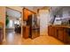 Gourmet kitchen with stainless steel refrigerator and view into breakfast nook at 2851 Granada Blvd, Kissimmee, FL 34746
