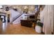 This living room boasts soaring ceilings, an open staircase, and a seamless transition to the kitchen at 2851 Granada Blvd, Kissimmee, FL 34746