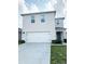 Charming two-story home with a two-car garage, manicured lawn, and appealing curb appeal at 2915 Turnstone, St Cloud, FL 34773