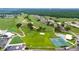 An aerial view showing the golf course and the community layout at 3161 Timberly Ln, Lakeland, FL 33810