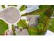 Aerial view of the property showcasing its location on a cul-de-sac and surrounded by greenery at 3161 Timberly Ln, Lakeland, FL 33810