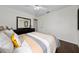 Comfortable bedroom with hardwood floors, neutral walls, and a ceiling fan at 3161 Timberly Ln, Lakeland, FL 33810