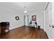 Bedroom with hardwood floors, neutral walls, ceiling fan and natural light at 3161 Timberly Ln, Lakeland, FL 33810