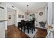Cozy dining area with a modern chandelier and comfortable seating for four at 3161 Timberly Ln, Lakeland, FL 33810