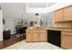 Kitchen features wood floors, granite countertops, and stainless steel appliances at 3161 Timberly Ln, Lakeland, FL 33810