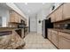 Functional kitchen featuring granite countertops, tiled backsplash, and stainless steel appliances at 3161 Timberly Ln, Lakeland, FL 33810