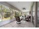 Enjoy the sunroom with tile floors and views of the backyard at 3161 Timberly Ln, Lakeland, FL 33810